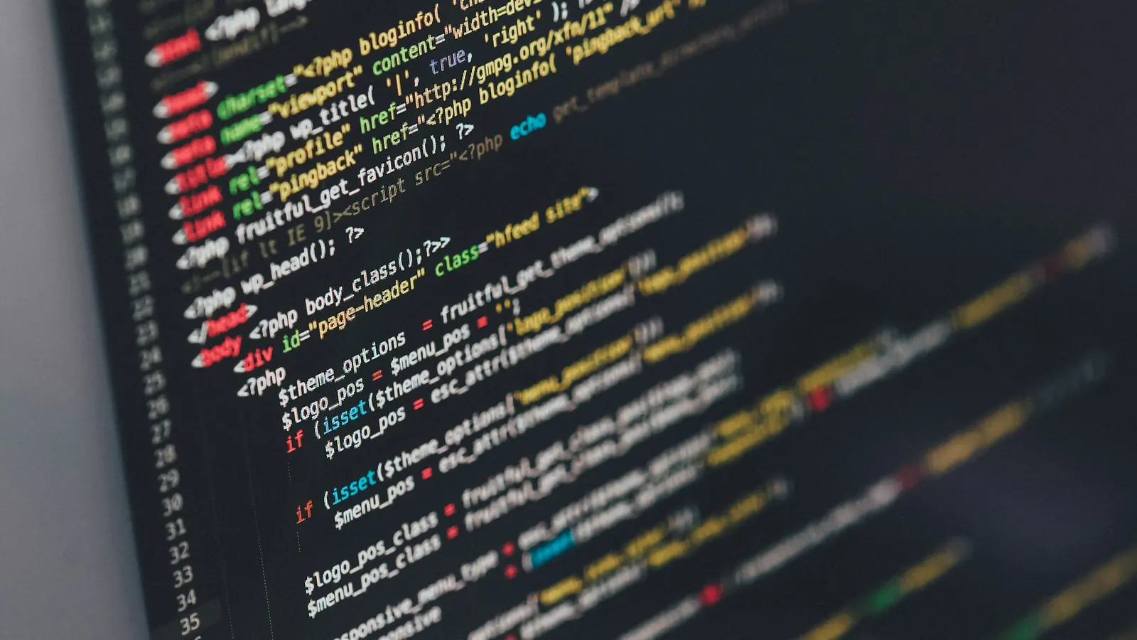 Monitor showing code in a software editor